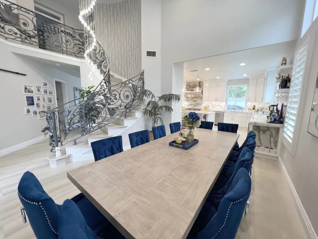 Orange County whole-home remodel with an open dining room and staircase