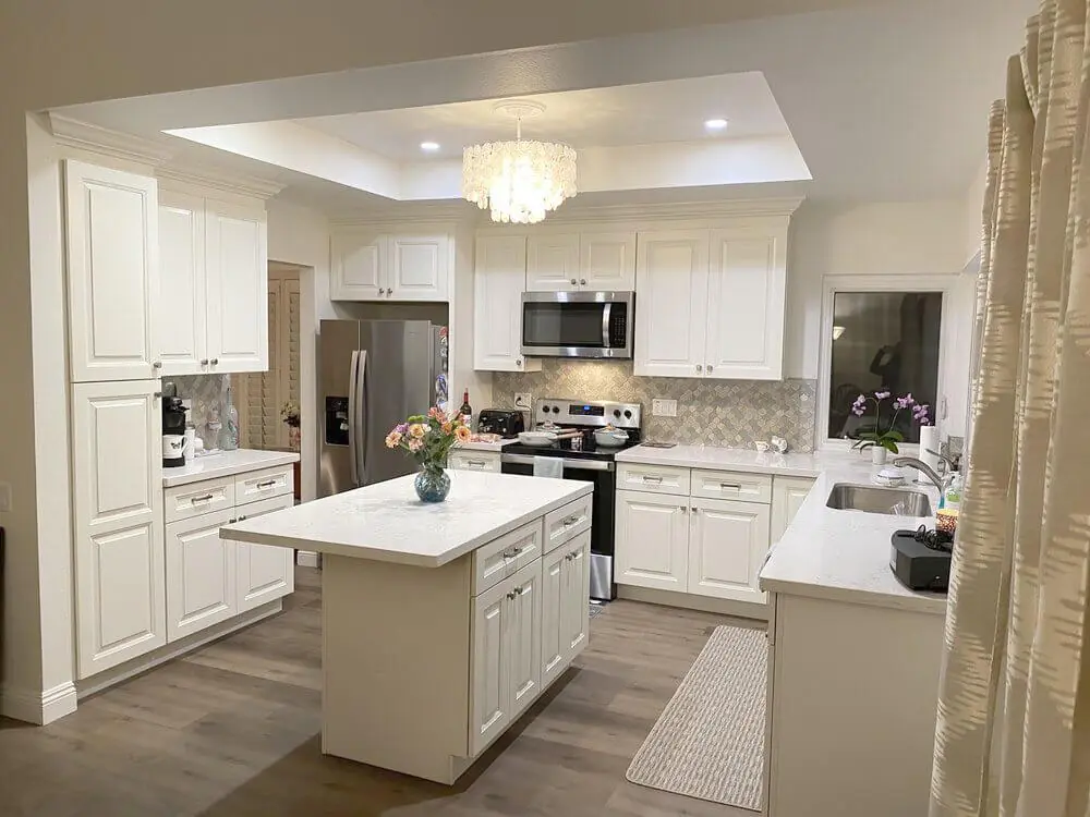 Opened up kitchen layout in Lake Forest with new counters and lighting